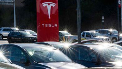 Tesla shares drop 12% after sales growth warning