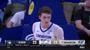 Creighton’s Ryan Kalkbrenner records a block then follows with a dunk on the other end vs. UConn