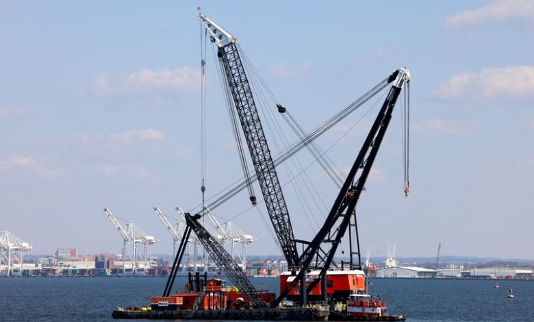 Salvage crews to lift first piece of collapsed Baltimore bridge