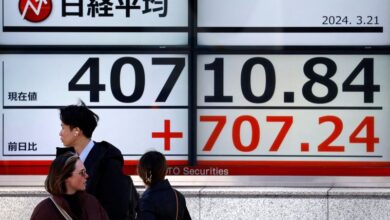 Asia stocks edge up on Nvidia hopes, NZ dollar jumps