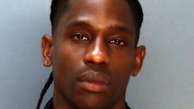 After Arrest, Travis Scott Turns Mug Shot Into T-shirt Design