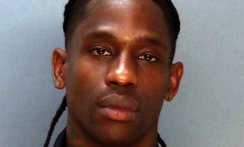 After Arrest, Travis Scott Turns Mug Shot Into T-shirt Design