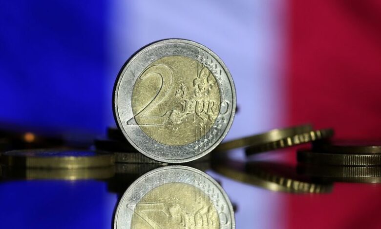 French stocks turn higher, risk premium steady as investors process election result