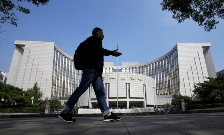 China central bank unexpectedly conducts medium-term loan operation, cuts interest rate