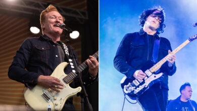 “You tell me, Professor, when you’re ready to go!” Conan O’Brien invites Jack White – and his wild custom Fenders – to swap solos on White Stripes and Eddie Cochran classics at the Newport Folk Festival