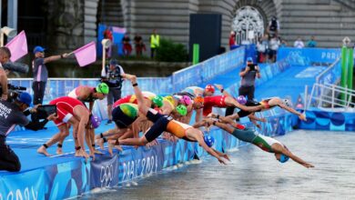 Olympic swimmers are guzzling cans of Coke to protect from bacteria in the Seine