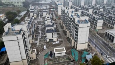 China to cut existing mortgage rates by end-Oct, cities ease home-buying curbs