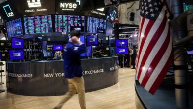 Dow and S&P end at fresh record highs, lifted by Netflix earnings and tech stocks