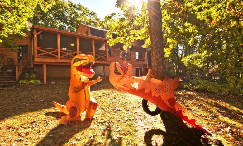 New Hampshire Homeowners Enlist a T-Rex Squad To Help Sell Their Home—and the Photos Are Hilarious