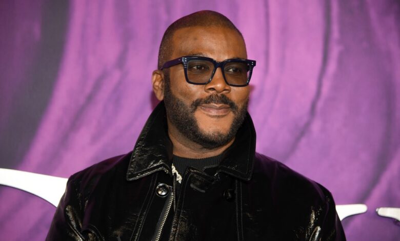 Tyler Perry Makes It Rain On Twerking Dancer At Usher Concert