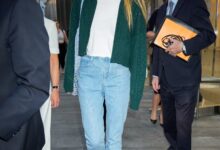 Sophie Turner Elevates Basic Sweatpants and Taylor Swift Merch With the Sandwich Technique