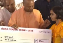 UP Chief Minister Yogi Adityanath hands over  ₹300 cheque to scholarship students; netizens react