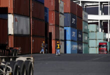 Japan’s exports rise faster than expected, helped by weaker yen