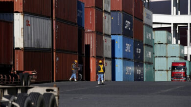 Japan’s exports rise faster than expected, helped by weaker yen