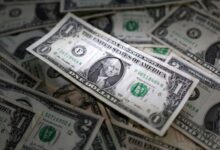 Dollar stands tall in 2024, propped up by cautious Fed, Trump trade