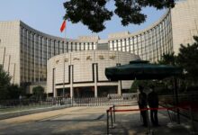 Chinese central banker warns of government bond risks as yields slide