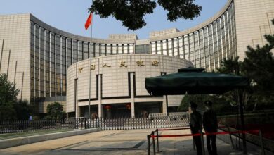 Chinese central banker warns of government bond risks as yields slide