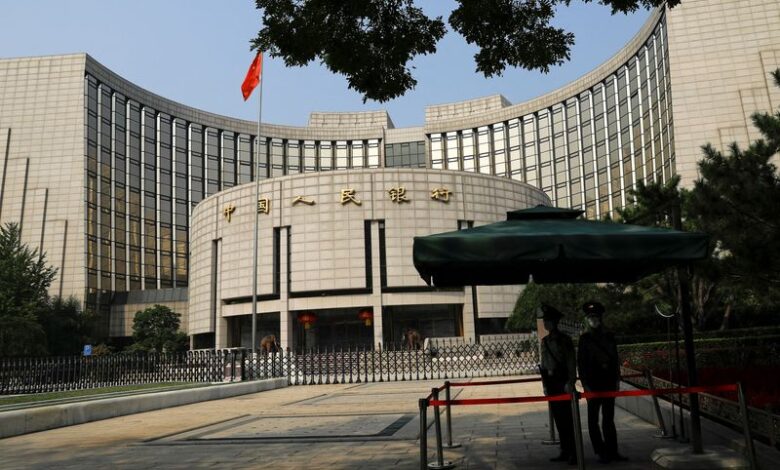 Chinese central banker warns of government bond risks as yields slide