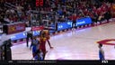 USC’s Rashaun Agee throws down a two-handed dunk, trimming the UCLA lead