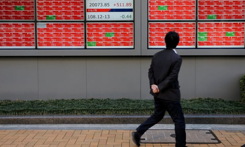 Stocks skid, bonds rally as tariffs stoke recession risk