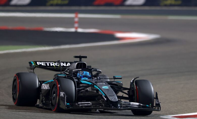 Russell plays down title contender status