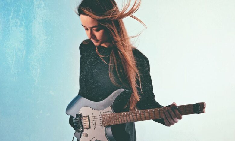 “My father was a big Pat Metheny fan – hearing him started to make me obsessed with the idea of playing music”: Berklee-educated and endorsed by Strandberg, meet Camilla Sperati – the fusion phenom hand-picked to open for Steve Vai