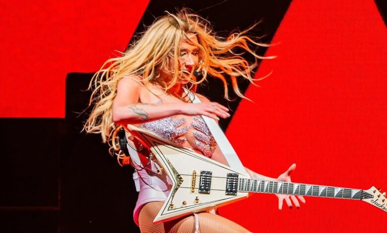Metal guitars have officially gone mainstream – as pop star Kesha is the latest to don a Jackson Rhoads model