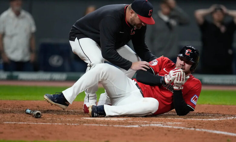 Guardians' David Fry carted off field after being hit in face by pitch while trying to bunt